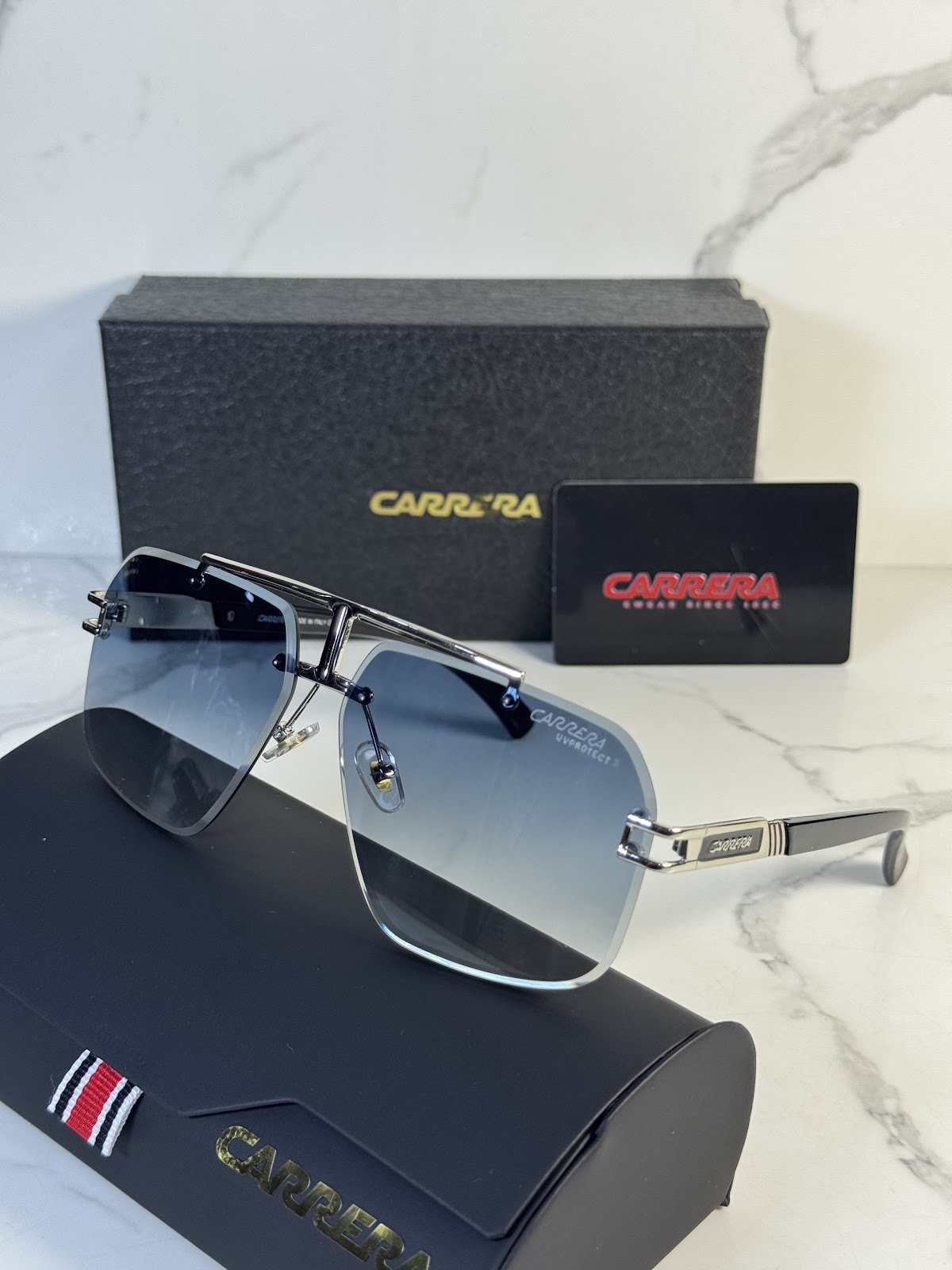 Lentes CARRERA — Ref. LF-L232-0004 con el packaging mostrado en la fotografía