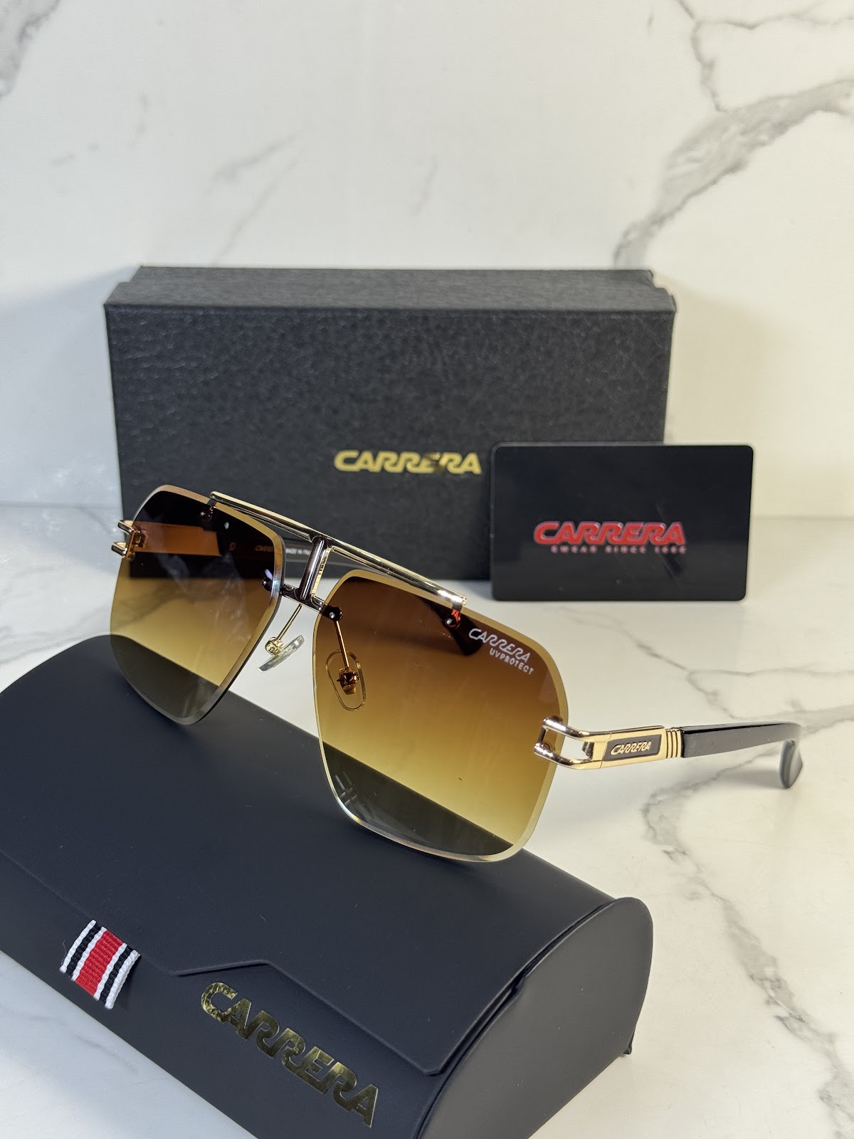 Lentes CARRERA — Ref. LF-L232-0009 con el packaging mostrado en la fotografía
