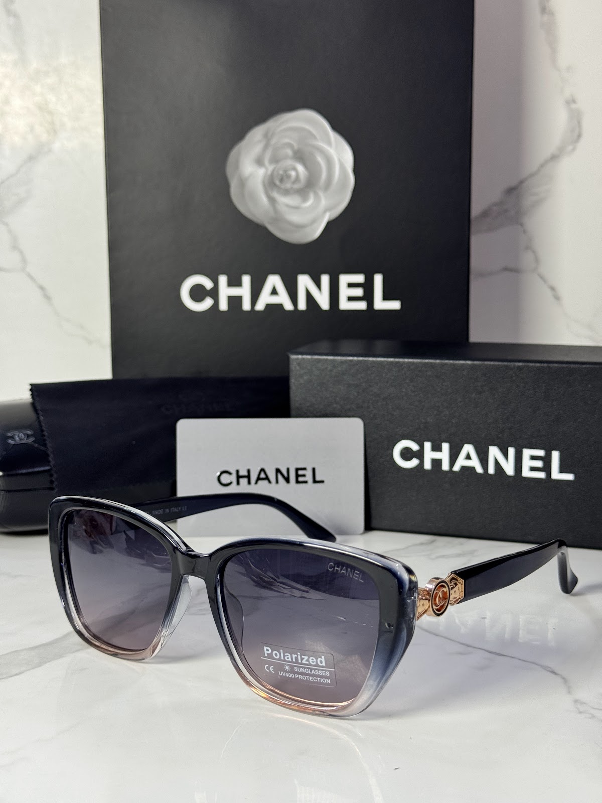 Lentes CHANEL — Ref. LF-L224-0030 con el packaging mostrado en la fotografía