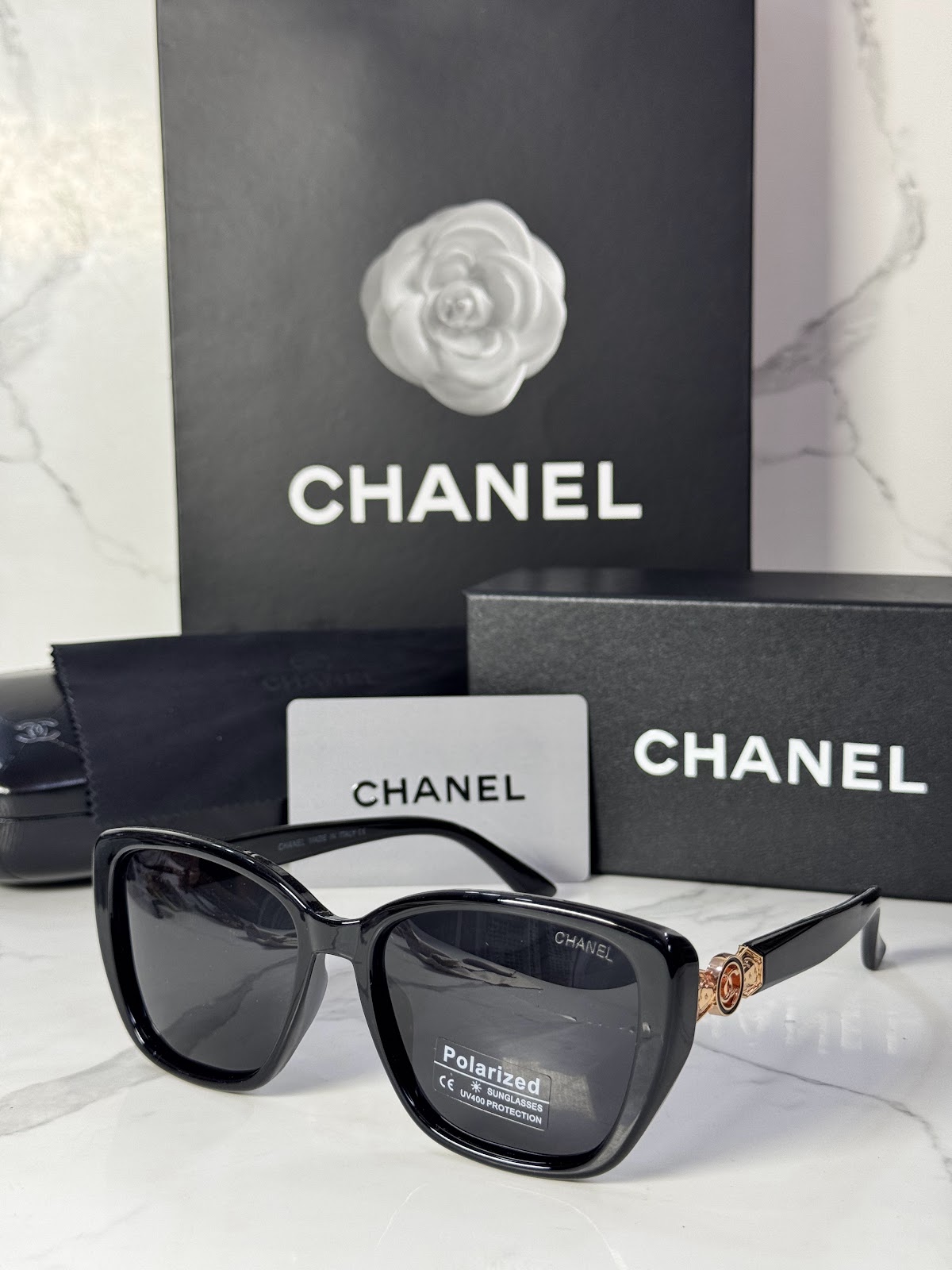 Lentes CHANEL — Ref. LF-L224-0032 con el packaging mostrado en la fotografía