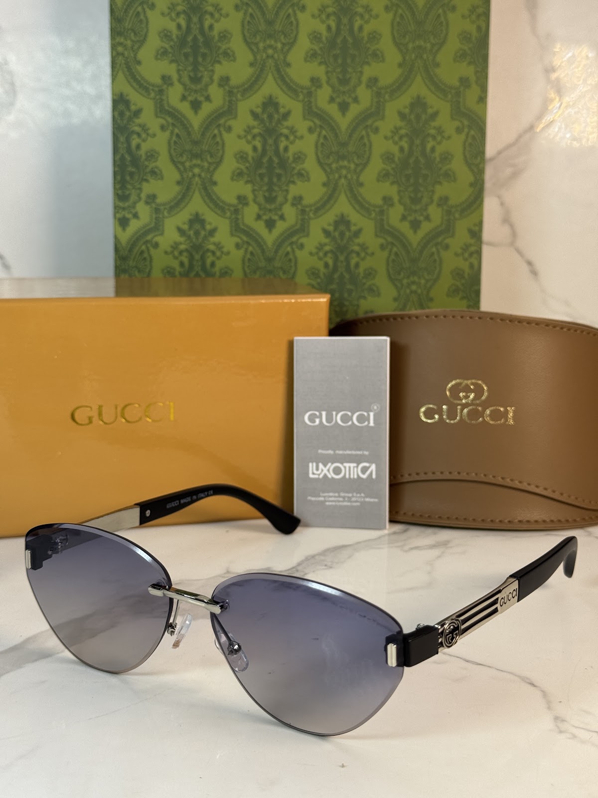 Lentes GUCCI — Ref. LF-L221-0002 con el packaging mostrado en la fotografía