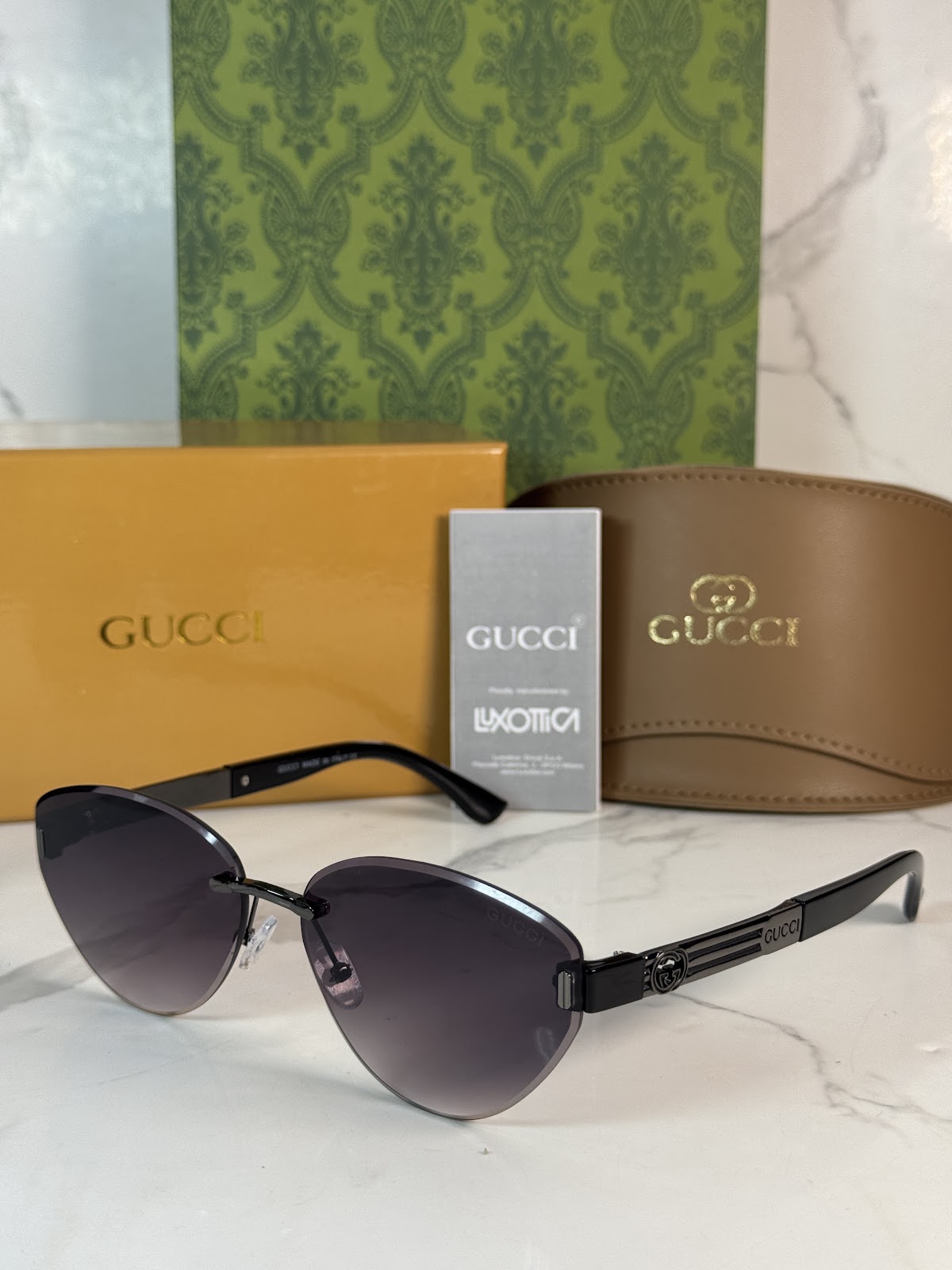 Lentes GUCCI — Ref. LF-L221-0005 con el packaging mostrado en la fotografía