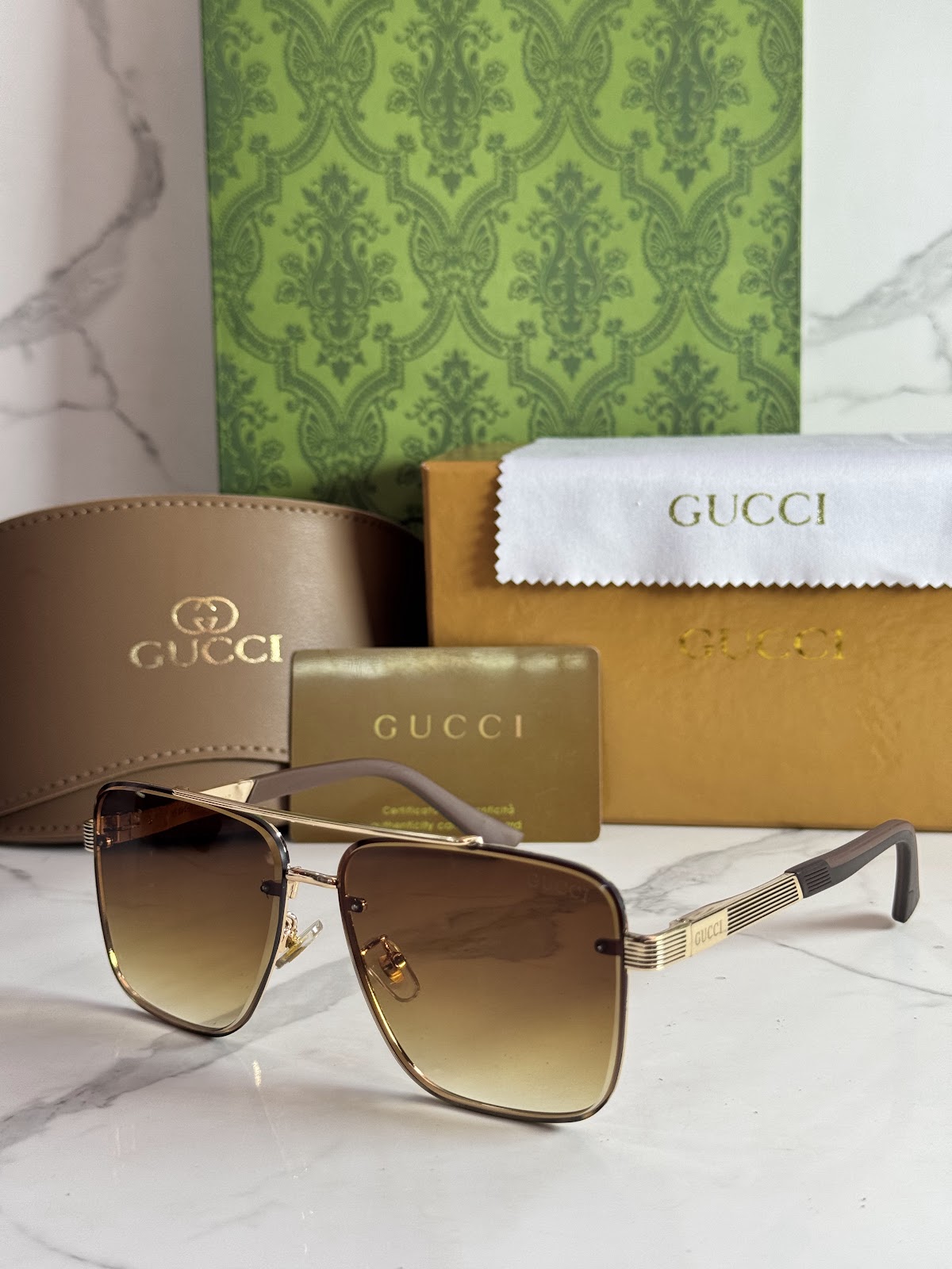 Lentes GUCCI — Ref. LF-L221-0043 con el packaging mostrado en la fotografía