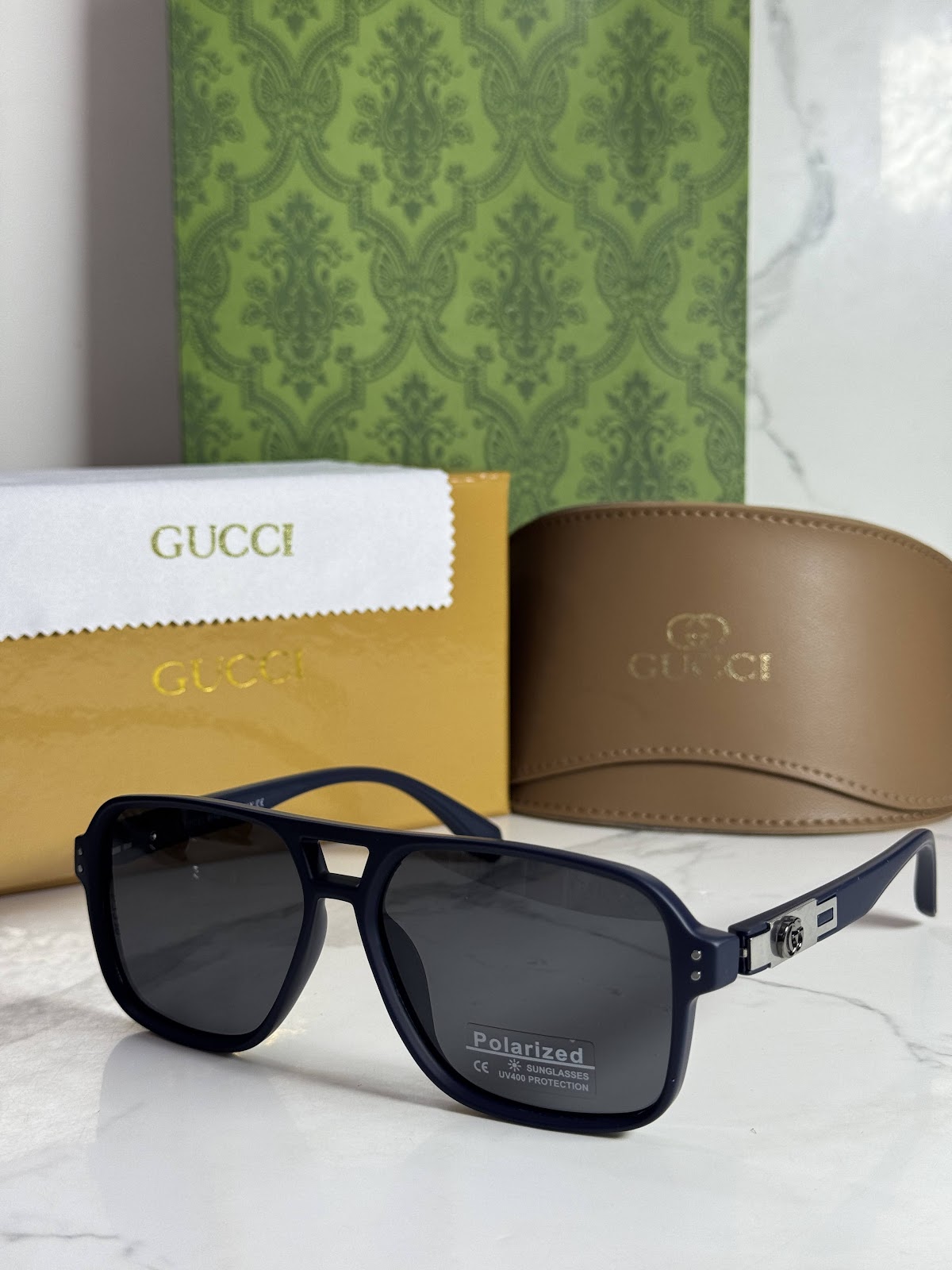 Lentes GUCCI — Ref. LF-L221-0052 con el packaging mostrado en la fotografía