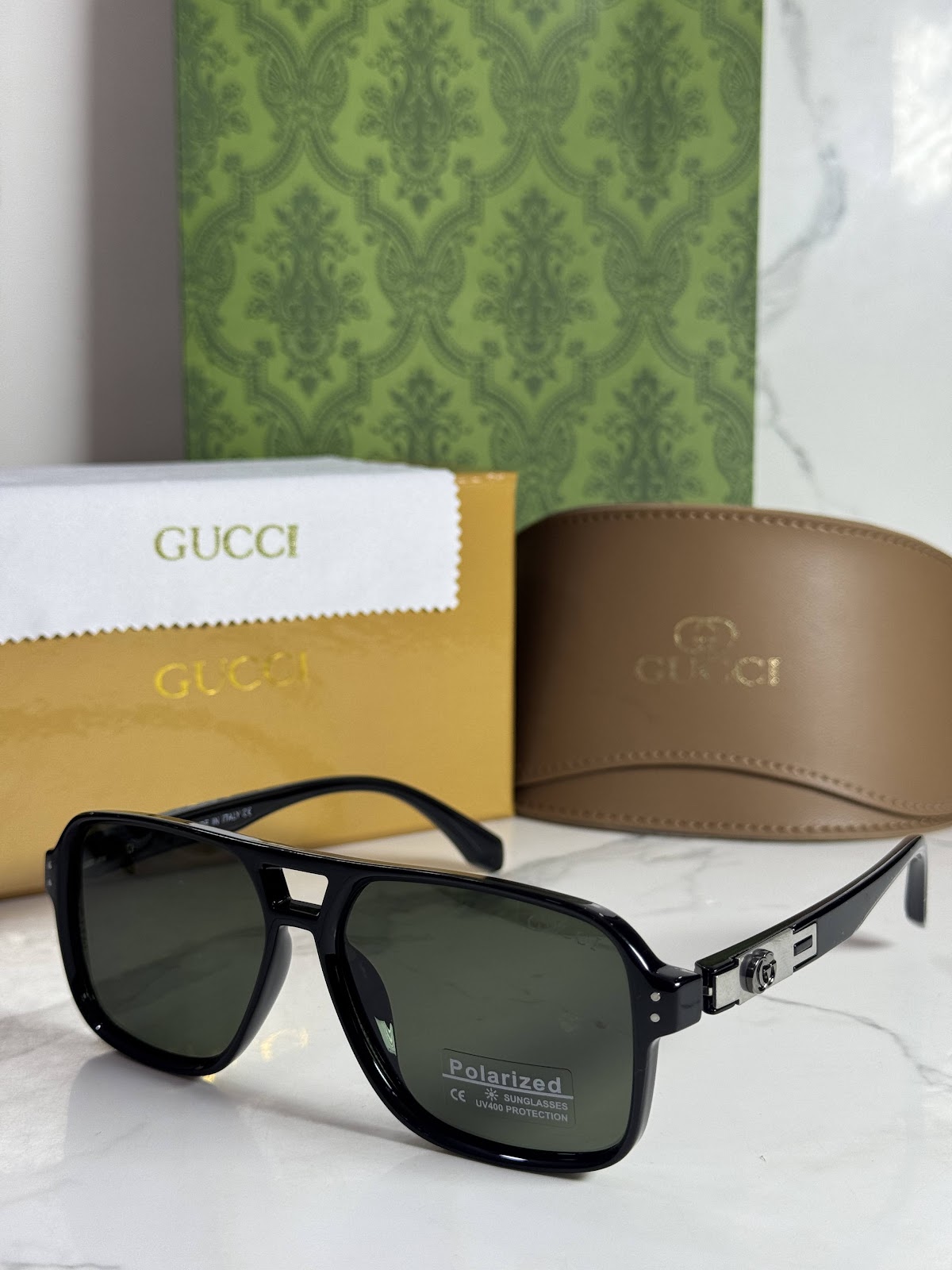 Lentes GUCCI — Ref. LF-L221-0055 con el packaging mostrado en la fotografía