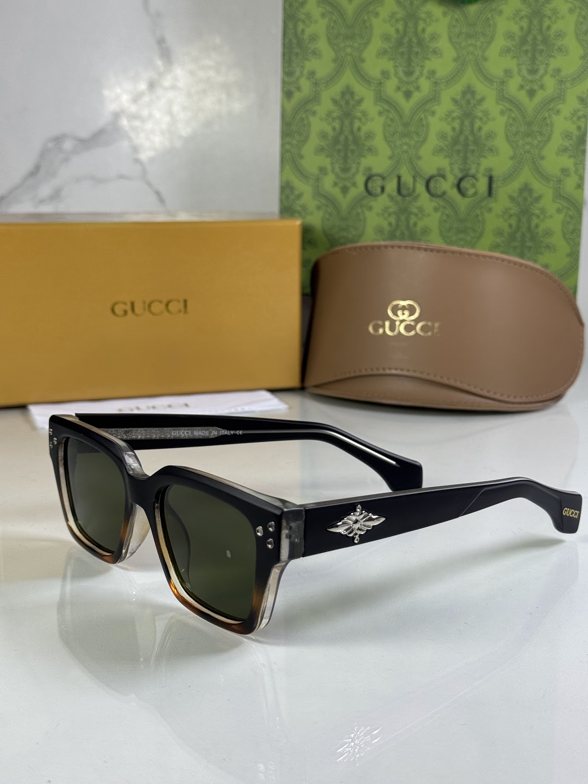 Lentes GUCCI — Ref. LF-L221-0058 con el packaging mostrado en la fotografía