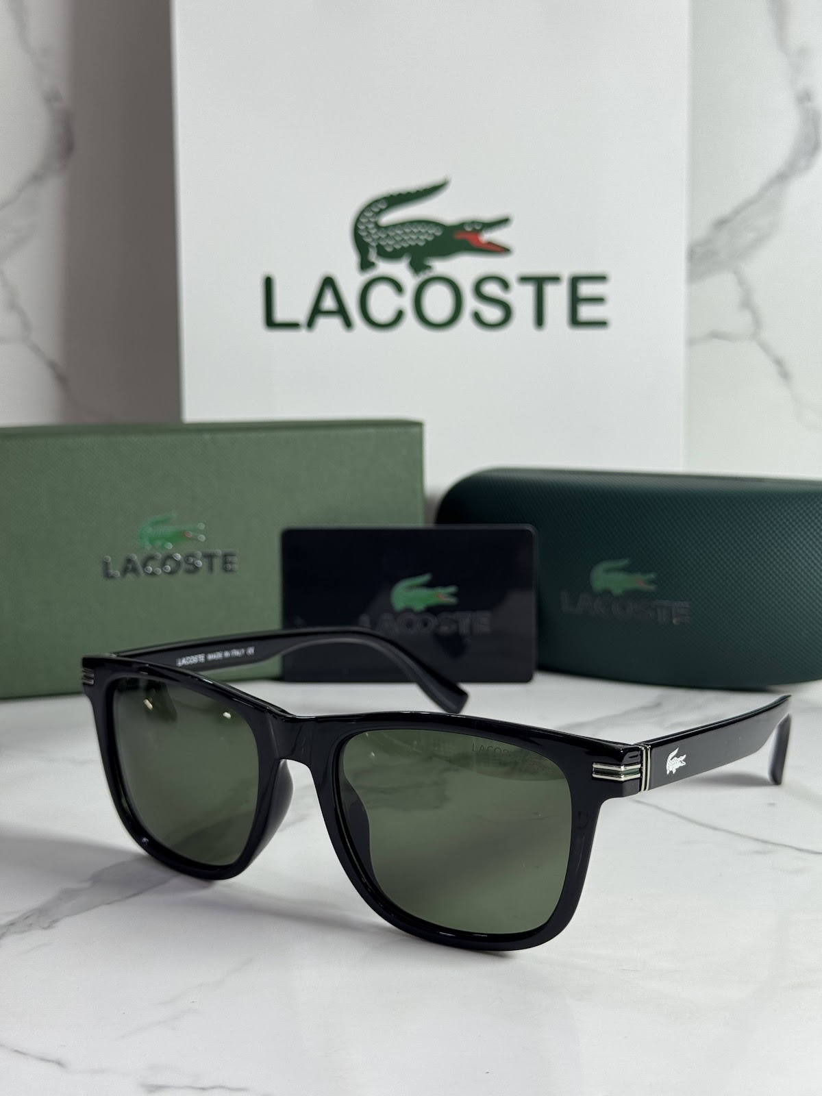 Lentes LACOSTE — Ref. LF-L233-0012 con el packaging mostrado en la fotografía