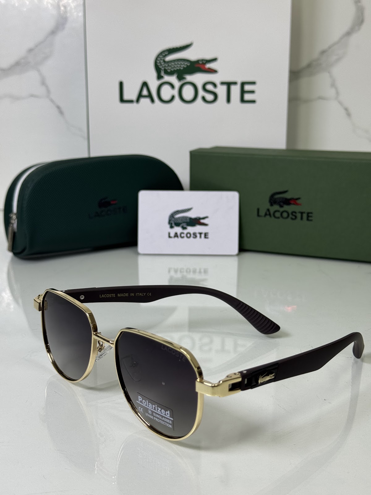 Lentes LACOSTE — Ref. LF-L233-0033 con el packaging mostrado en la fotografía
