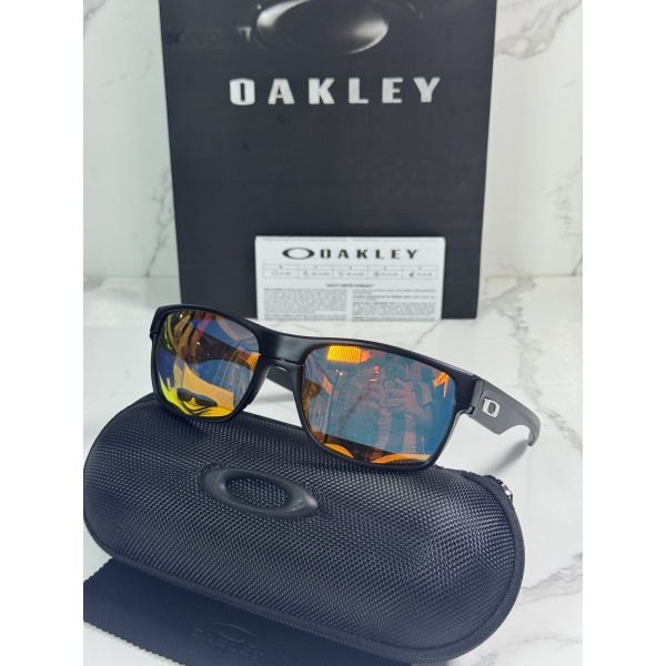 Lentes OAKLEY — Ref. LF-L235-0002 con el packaging mostrado en la fotografía