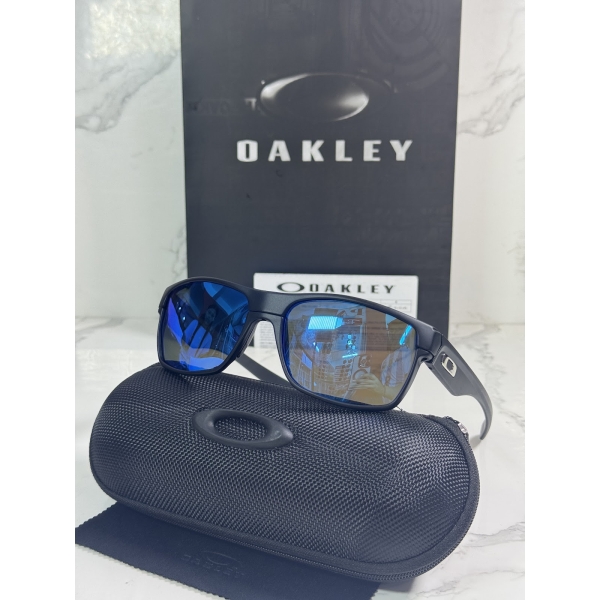 Lentes OAKLEY — Ref. LF-L235-0007 con el packaging mostrado en la fotografía