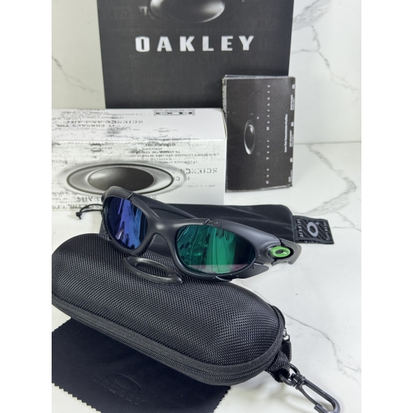 Lentes OAKLEY — Ref. LF-L235-0042 con el packaging mostrado en la fotografía