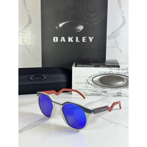 Lentes OAKLEY — Ref. LF-L235-0066 con el packaging mostrado en la fotografía