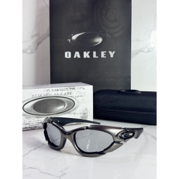 Lentes OAKLEY — Ref. LF-L235-0089 con el packaging mostrado en la fotografía