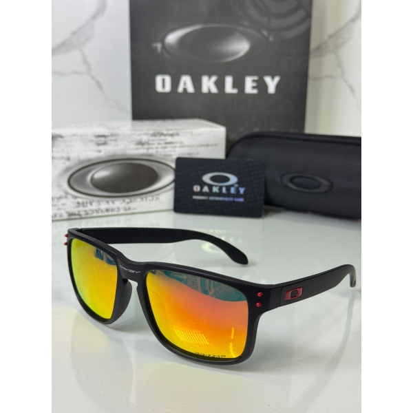 Lentes OAKLEY — Ref. LF-L235-0096 con el packaging mostrado en la fotografía