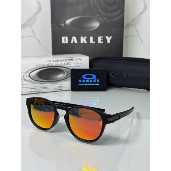 Lentes OAKLEY — Ref. LF-L235-0102 con el packaging mostrado en la fotografía
