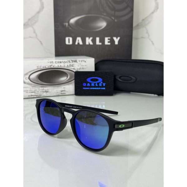 Lentes OAKLEY — Ref. LF-L235-0103 con el packaging mostrado en la fotografía