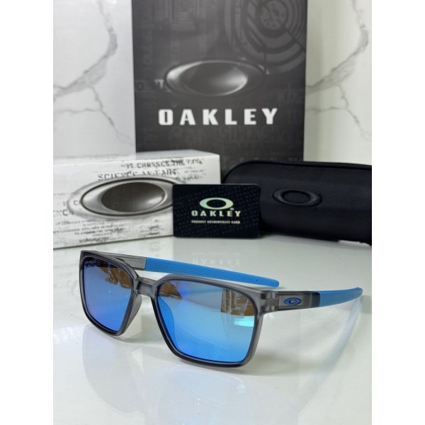 Lentes OAKLEY — Ref. LF-L235-0110 con el packaging mostrado en la fotografía