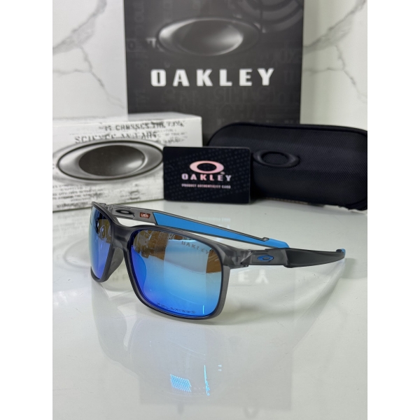 Lentes OAKLEY — Ref. LF-L235-0122 con el packaging mostrado en la fotografía