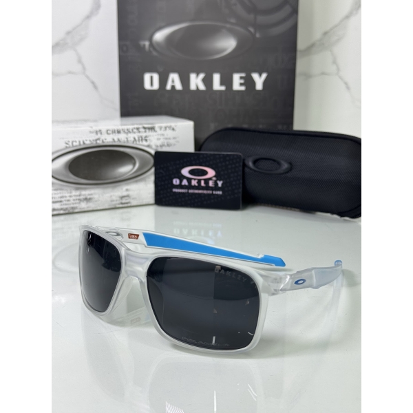 Lentes OAKLEY — Ref. LF-L235-0125 con el packaging mostrado en la fotografía