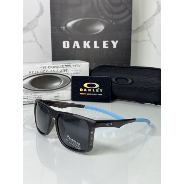 Lentes OAKLEY — Ref. LF-L235-0127 con el packaging mostrado en la fotografía