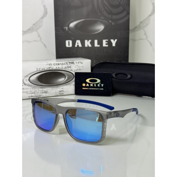 Lentes OAKLEY — Ref. LF-L235-0128 con el packaging mostrado en la fotografía