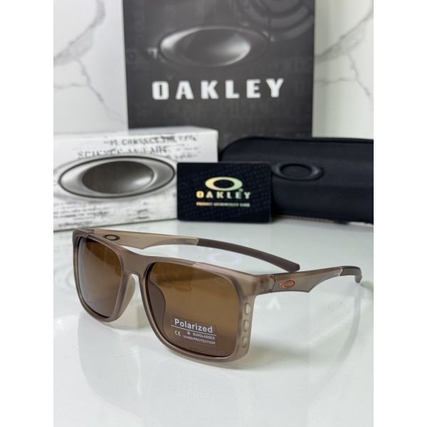 Lentes OAKLEY — Ref. LF-L235-0129 con el packaging mostrado en la fotografía