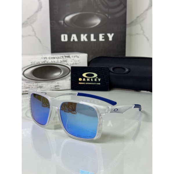 Lentes OAKLEY — Ref. LF-L235-0130 con el packaging mostrado en la fotografía