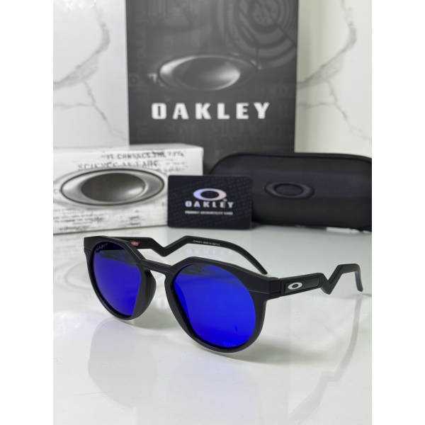 Lentes OAKLEY — Ref. LF-L235-0138 con el packaging mostrado en la fotografía