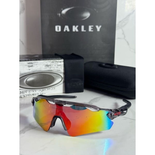 Lentes OAKLEY — Ref. LF-L235-0183 con el packaging mostrado en la fotografía