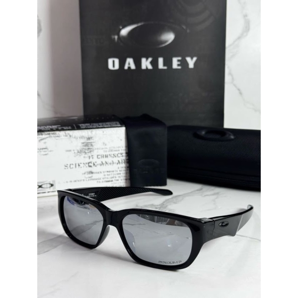 Lentes OAKLEY — Ref. LF-L235-0229 con el packaging mostrado en la fotografía