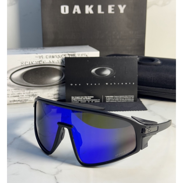 Lentes OAKLEY — Ref. LF-L235-0243 con el packaging mostrado en la fotografía