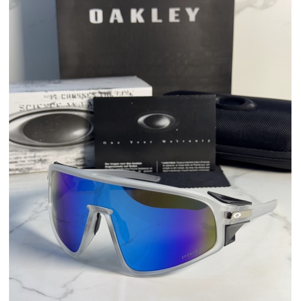 Lentes OAKLEY — Ref. LF-L235-0245 con el packaging mostrado en la fotografía