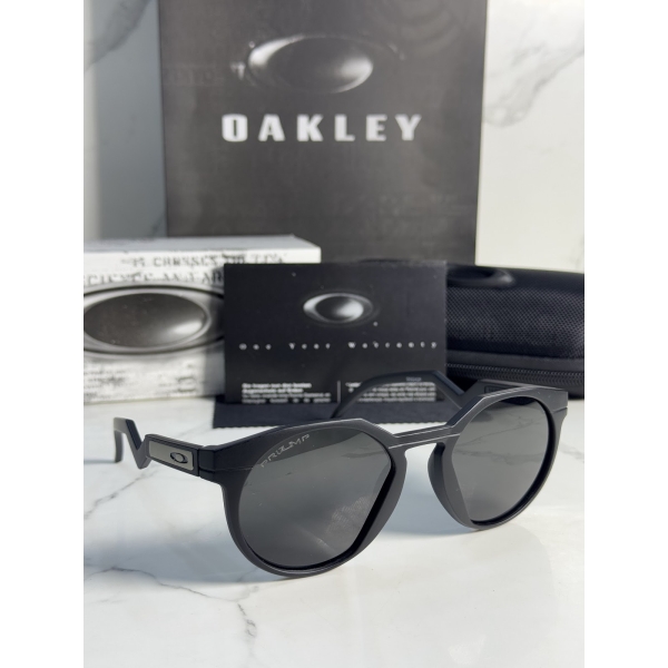 Lentes OAKLEY — Ref. LF-L235-0255 con el packaging mostrado en la fotografía