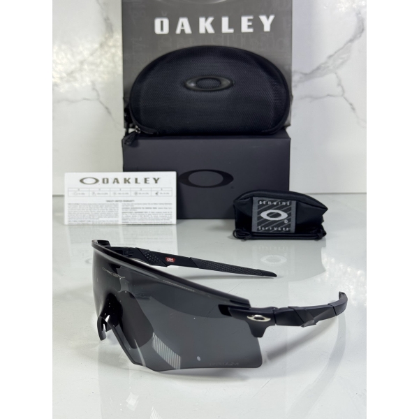 Lentes OAKLEY — Ref. LF-L235-0260 con el packaging mostrado en la fotografía