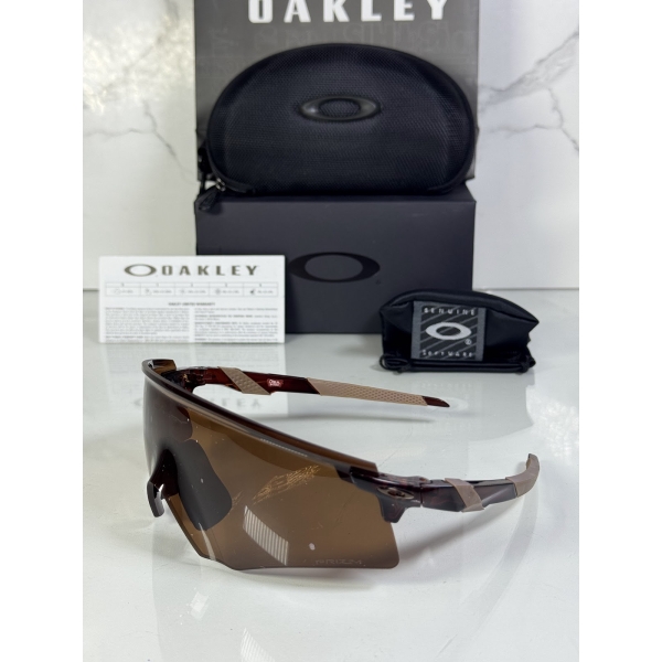 Lentes OAKLEY — Ref. LF-L235-0267 con el packaging mostrado en la fotografía