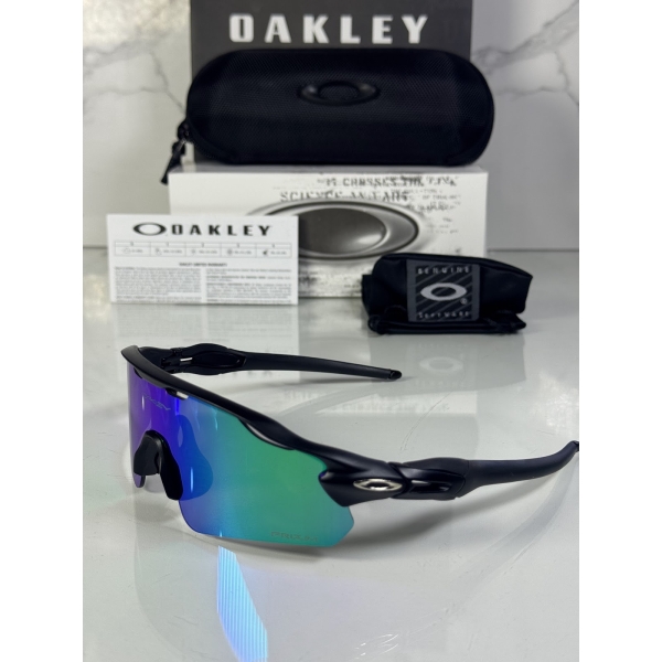 Lentes OAKLEY — Ref. LF-L235-0293 con el packaging mostrado en la fotografía