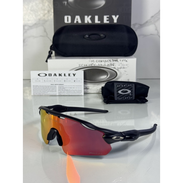 Lentes OAKLEY — Ref. LF-L235-0296 con el packaging mostrado en la fotografía