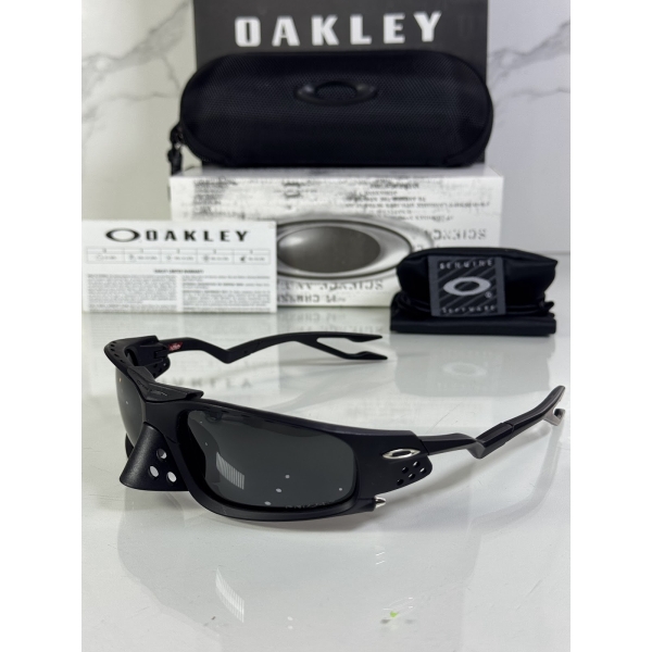 Lentes OAKLEY — Ref. LF-L235-0322 con el packaging mostrado en la fotografía