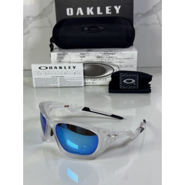 Lentes OAKLEY — Ref. LF-L235-0326 con el packaging mostrado en la fotografía