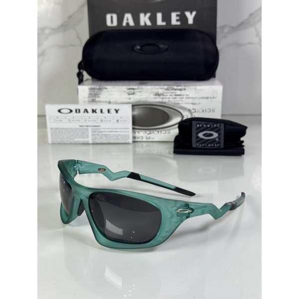 Lentes OAKLEY — Ref. LF-L235-0327 con el packaging mostrado en la fotografía