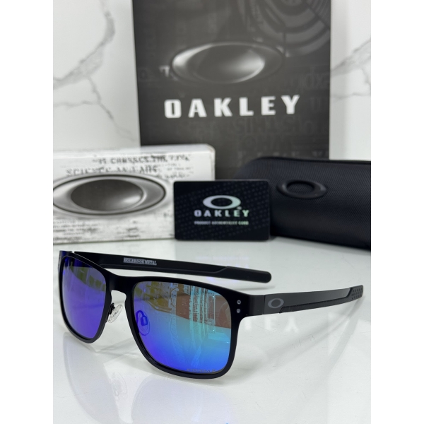 Lentes OAKLEY — Ref. LF-L235-0346 con el packaging mostrado en la fotografía