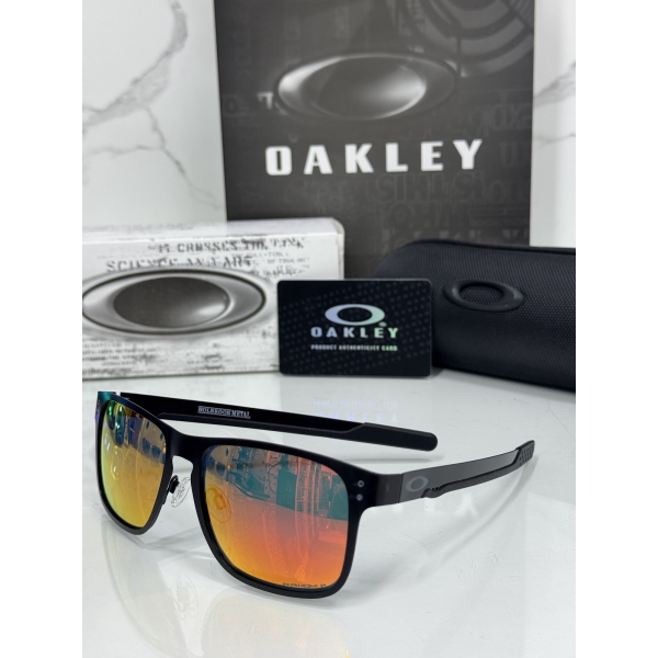Lentes OAKLEY — Ref. LF-L235-0348 con el packaging mostrado en la fotografía