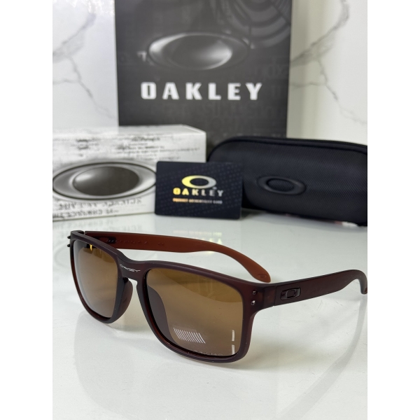 Lentes OAKLEY — Ref. LF-L235-0355 con el packaging mostrado en la fotografía
