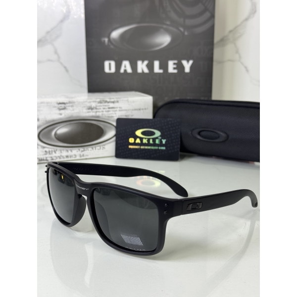 Lentes OAKLEY — Ref. LF-L235-0356 con el packaging mostrado en la fotografía