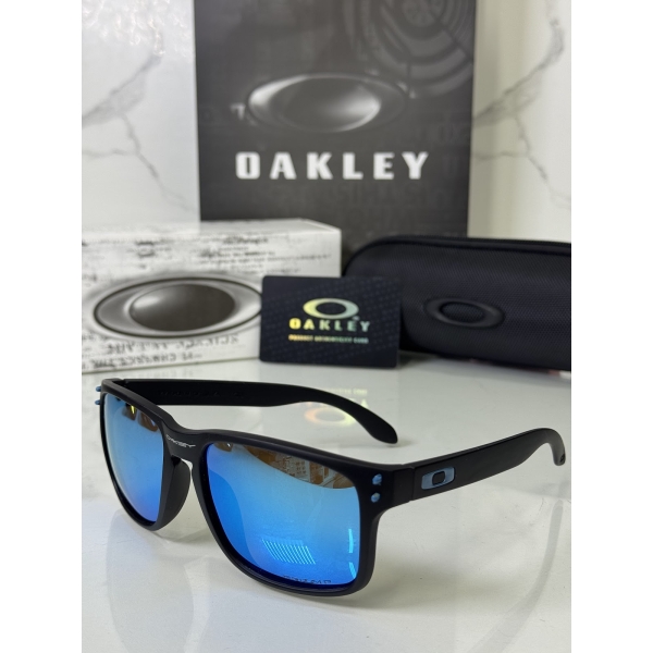 Lentes OAKLEY — Ref. LF-L235-0357 con el packaging mostrado en la fotografía