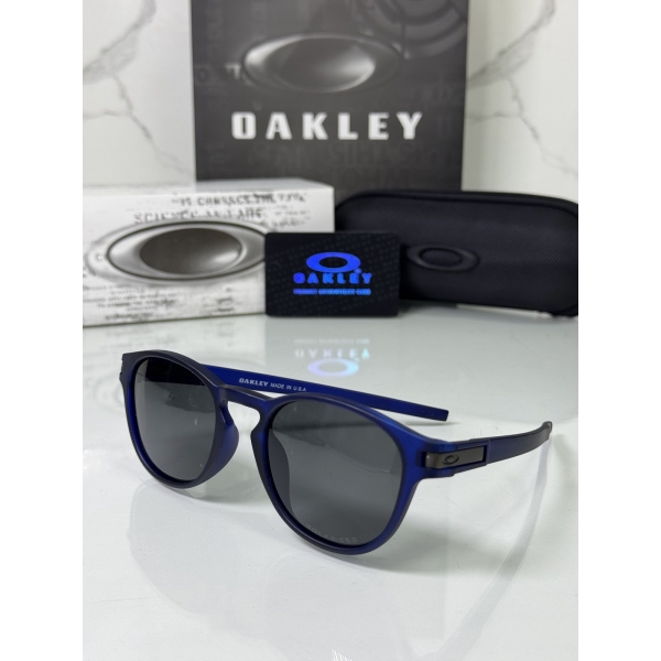 Lentes OAKLEY — Ref. LF-L235-0362 con el packaging mostrado en la fotografía