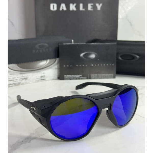 Lentes OAKLEY — Ref. LF-L235-0414 con el packaging mostrado en la fotografía