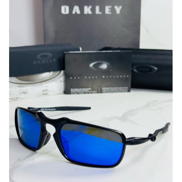 Lentes OAKLEY — Ref. LF-L235-0427 con el packaging mostrado en la fotografía