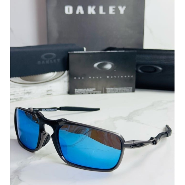 Lentes OAKLEY — Ref. LF-L235-0428 con el packaging mostrado en la fotografía