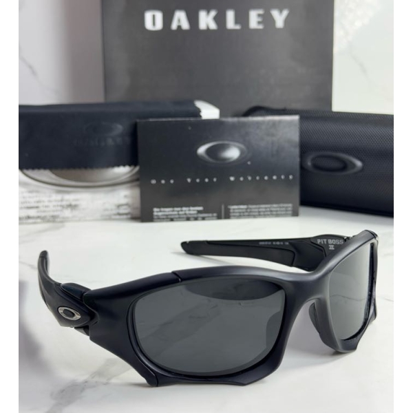 Lentes OAKLEY — Ref. LF-L235-0429 con el packaging mostrado en la fotografía